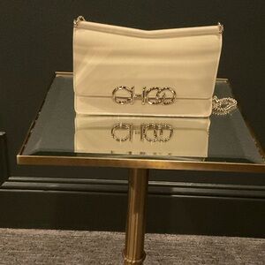 Elegant Cream Designer Chain Bag. Jimmy Choo